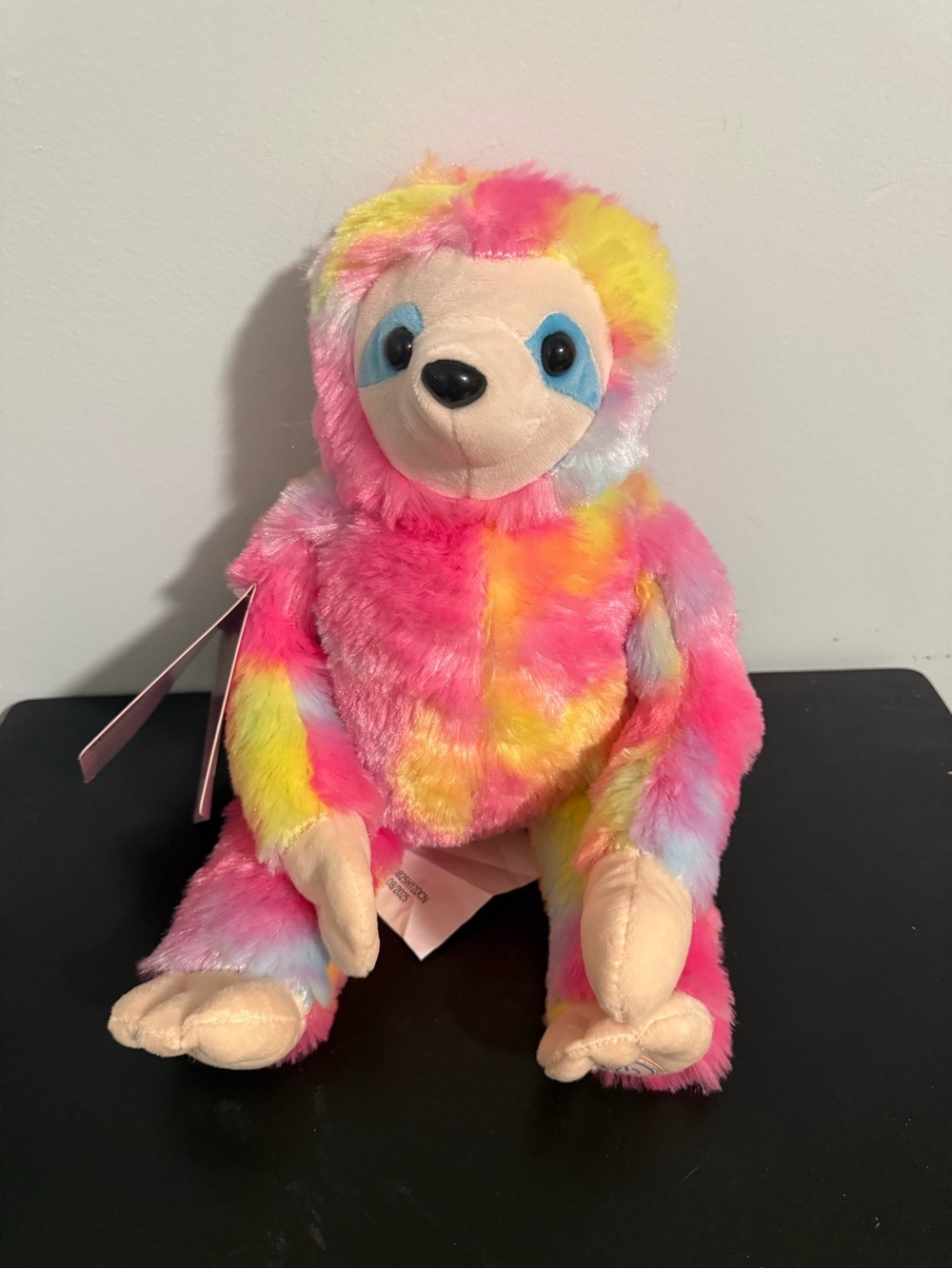Huggable Massager Plush Rainbow Sloth Soothing Stuffed animal. NWT